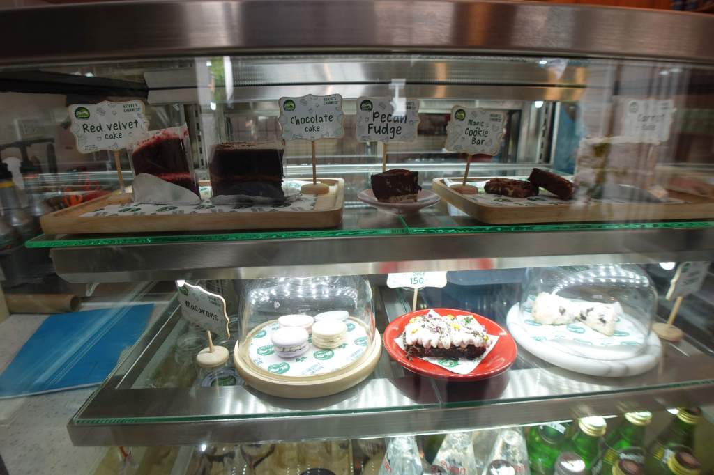 Cake display at Nature’s Charm Vegan Café, Bangkok.