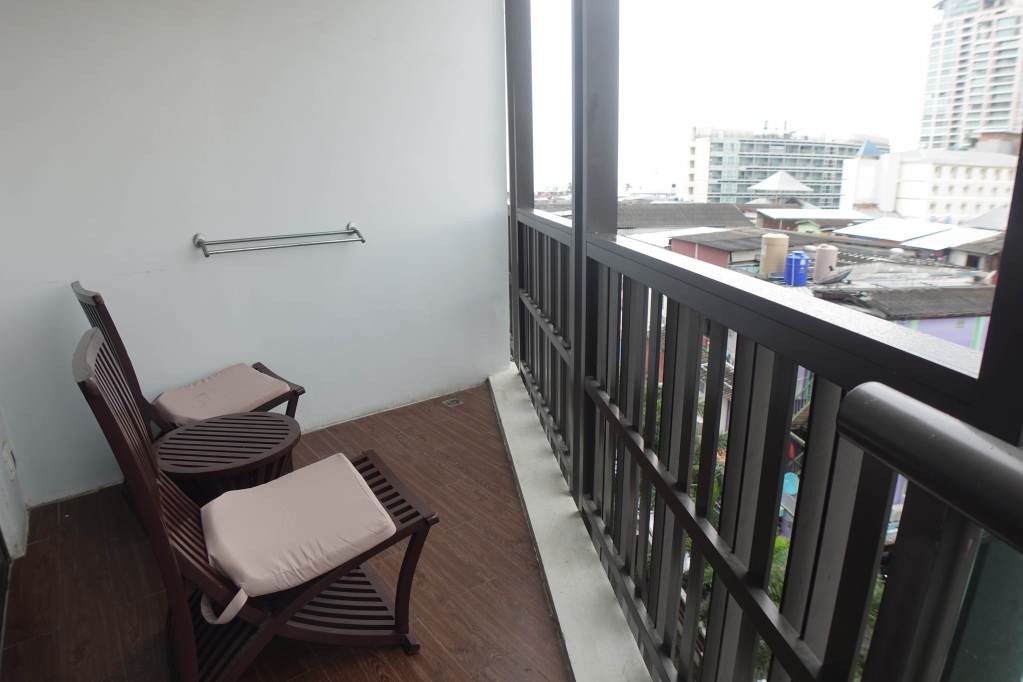 Room balcony at Pattaya Discovery Beach Hotel in Thailand.
