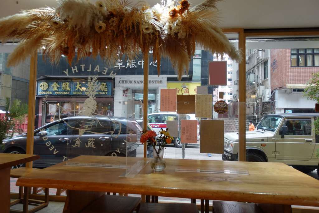 View of street from Everyday vegetarian restaurant in Hong Kong.