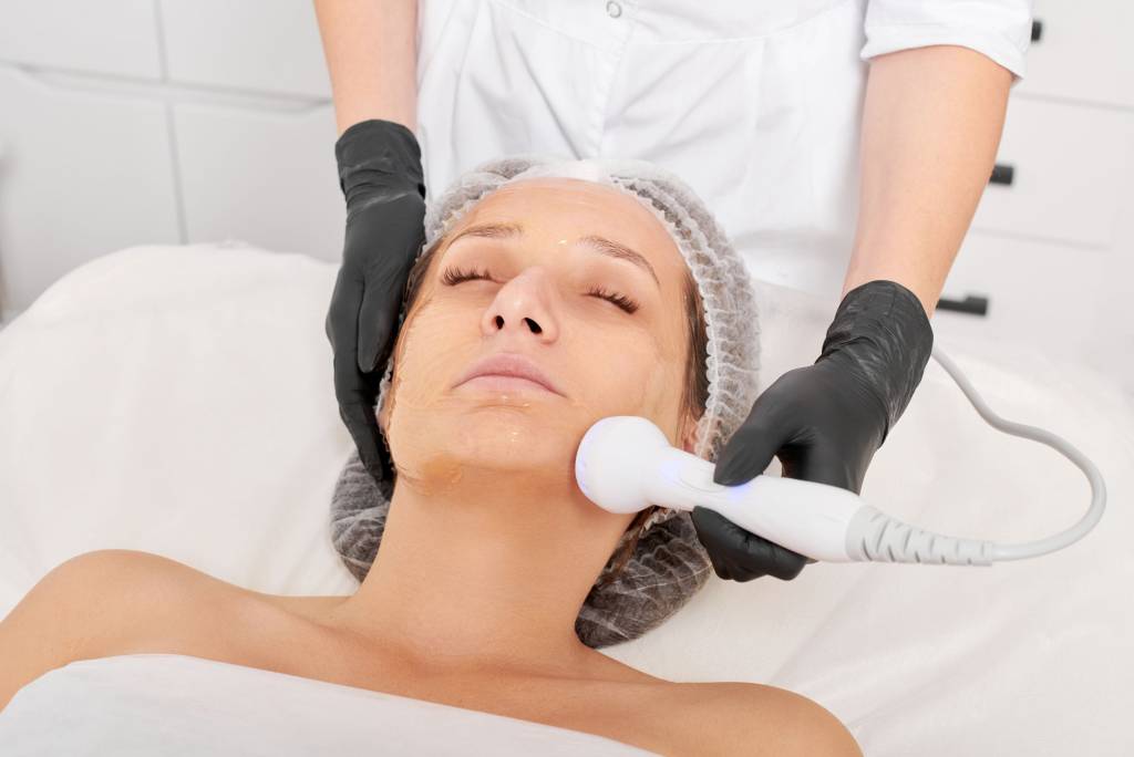 Woman having anti-ageing treatment.