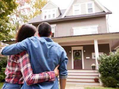 Couple looking at new house.