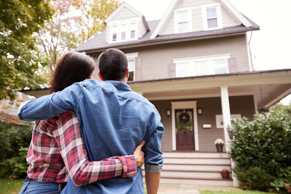 Couple looking at new house.