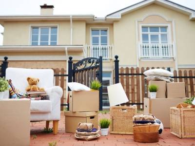 Furniture outside house ready for relocation.