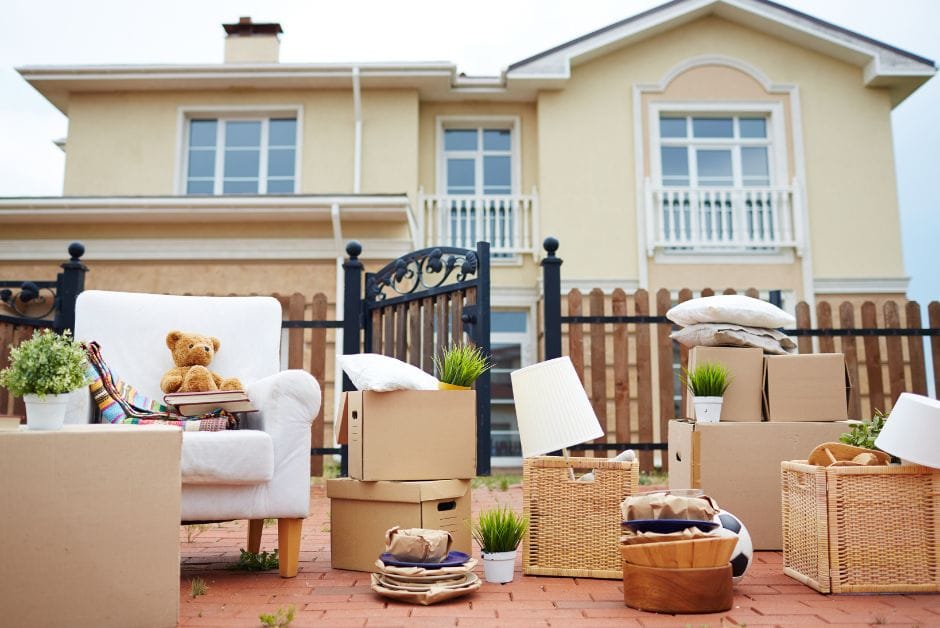 Furniture outside house ready for relocation.
