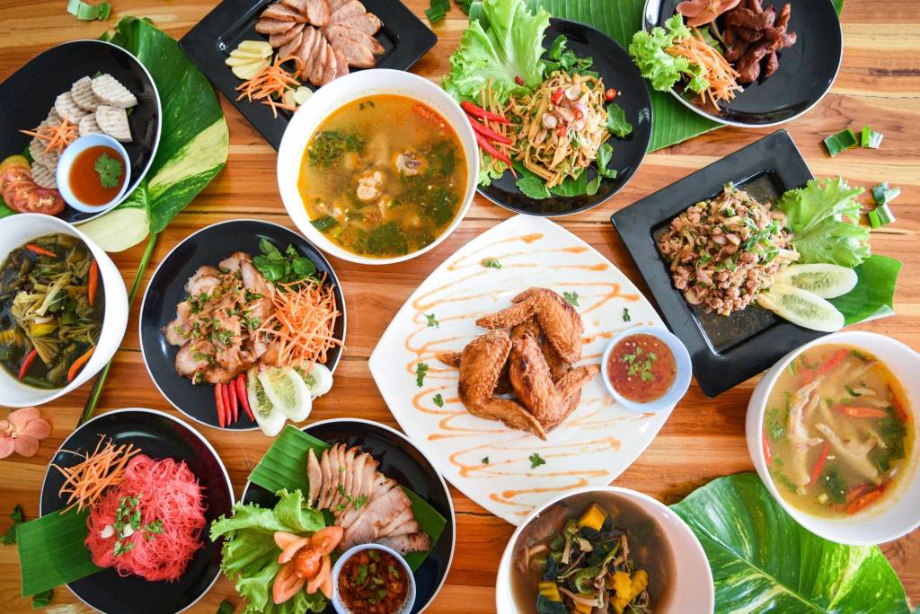 Traditional Thai dishes on table.