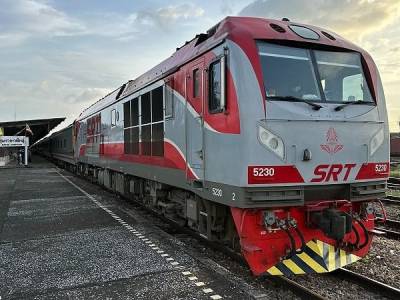 A train at a station in Thailand.