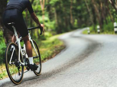 Cyclist cycling uphill.