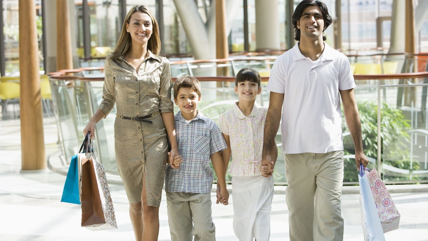 A family shopping in a mall.