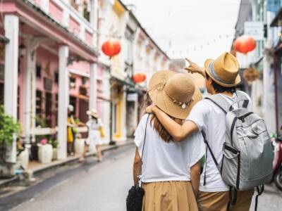 Tourists in Phuket Old Town, Thailand.