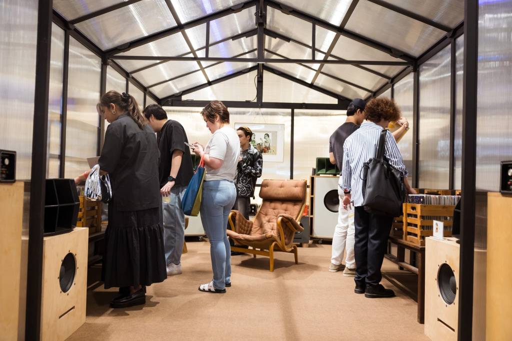 People browsing at Made By Legacy's "Vintage Revival: The Found & Reels" vintage exhibition in Bangkok.