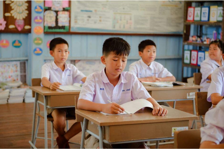 Thai students studying in a classroom.