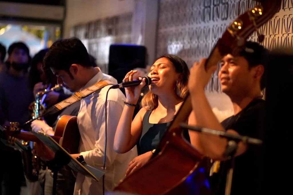 Band performing at the Chiang Mai Street Jazz Festival .