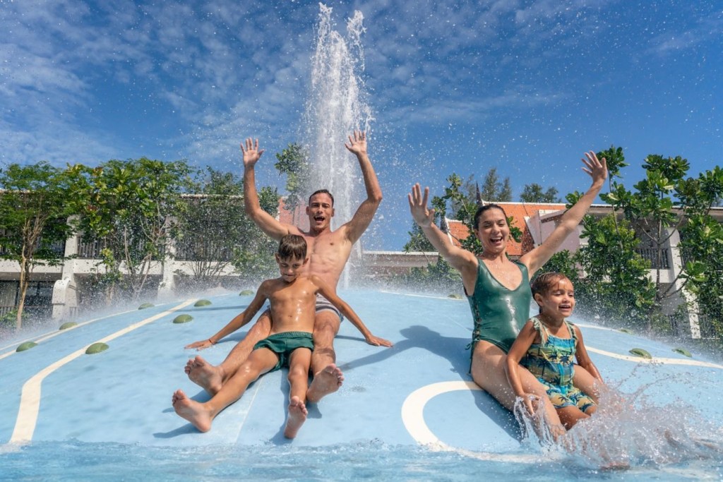 Family playing in the play zone at JW Marriott Khao Lak Resort & Spa in Thailand.