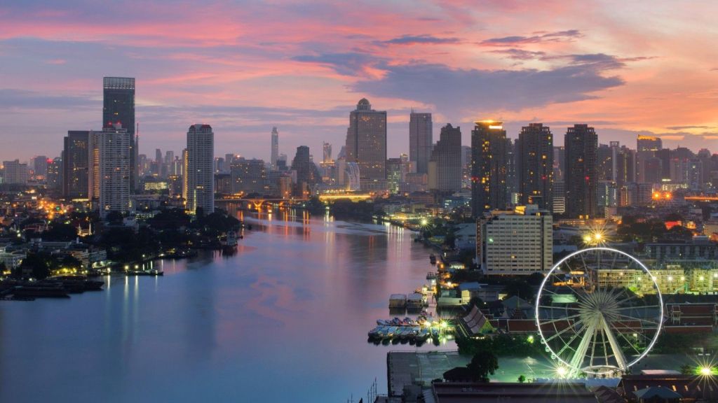 The ferris wheel at Asiatique The Riverfront Destination, with the Chao Phraya River skyline.