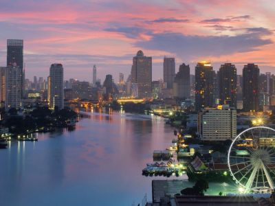 The ferris wheel at Asiatique The Riverfront Destination, with the Chao Phraya River skyline.