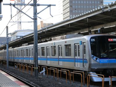 Tokyo Metro train at station.