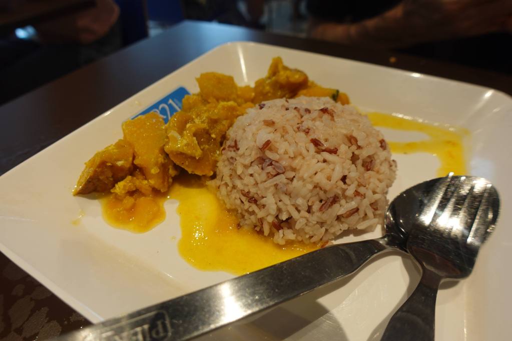 Pumpkin and wholegrain rice at Stall 10 - vegetarian and vegan dining at Terminal 21 in Pattaya, Thailand.