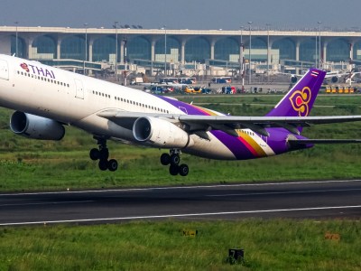 Thai Airways plane mid-flight.